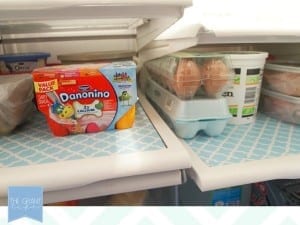 use contact paper to redo your fridge shelves