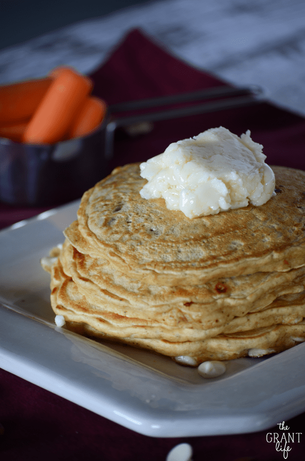 Carrot cake pancakes with chocolate chips and cream cheese frosting