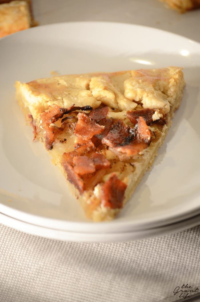 Bacon onion tart filled with crisp bacon and carmelized onion
