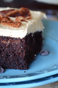 Delicious chocolate cake with peanut butter frosting and crispy bacon on top