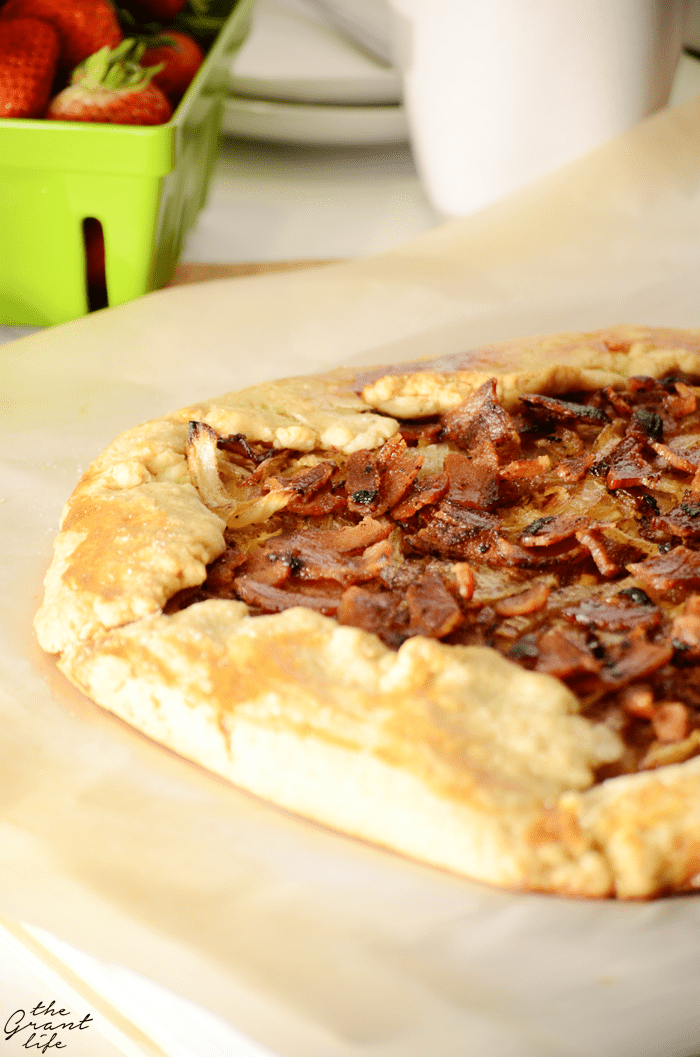 Easy bacon onion tart filled with crispy bacon