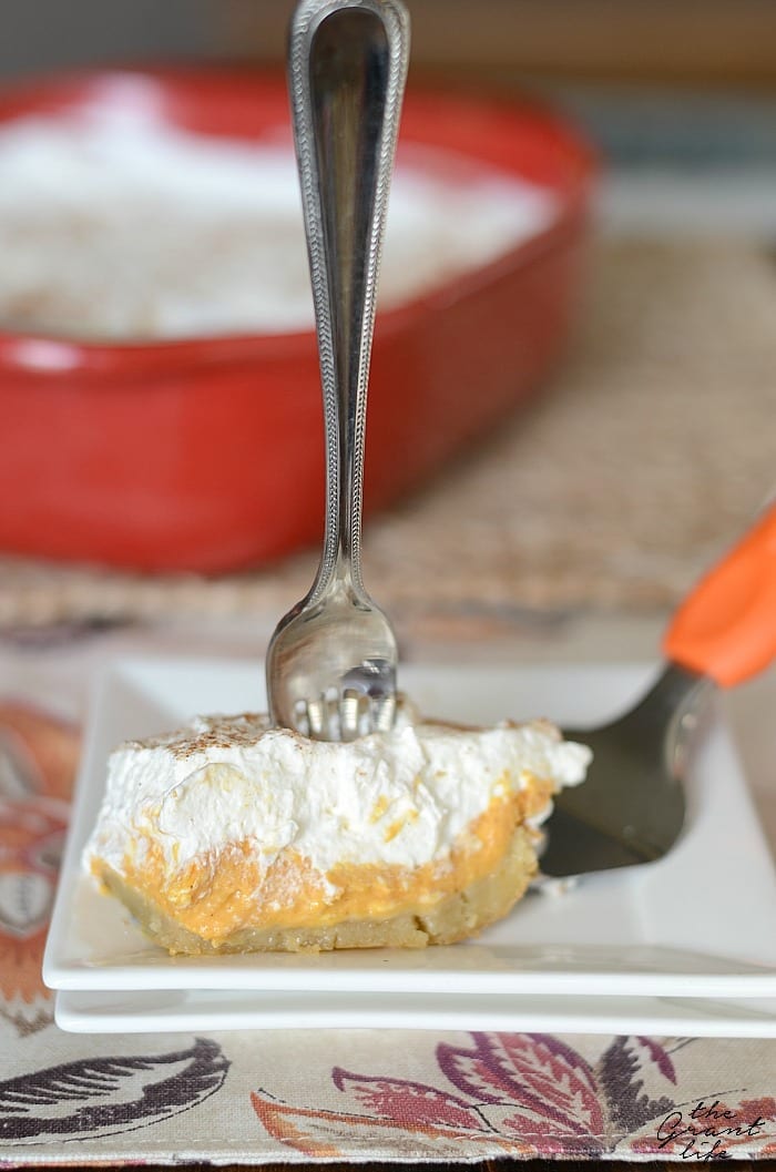 Pumpkin cheesecake dessert with sugar cookie crust!