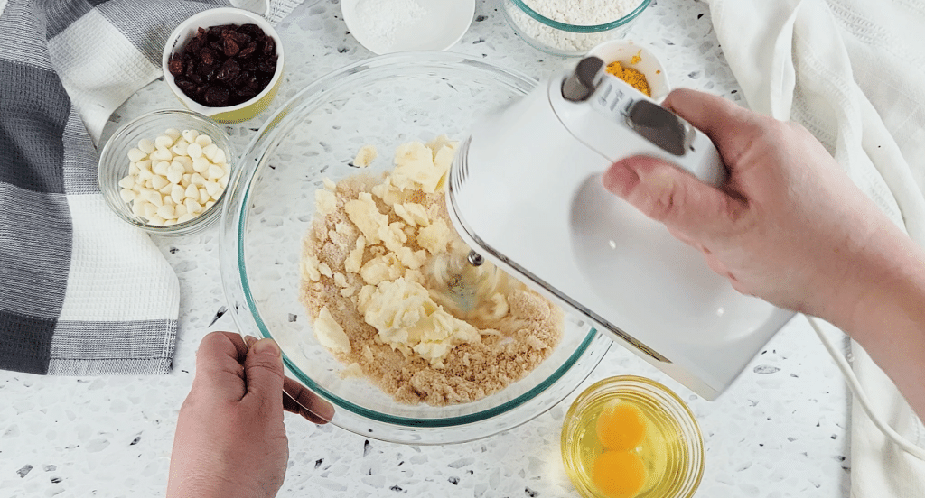 creaming the butter and sugars together in a glass bowl