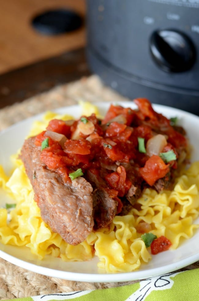 close up of crock pot swiss steak recipe finished on a plate