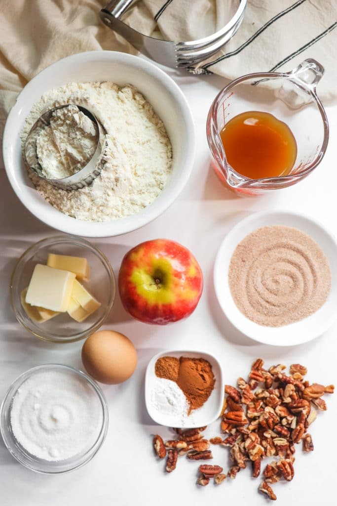 bowls filled with ingredients for apple cider scones