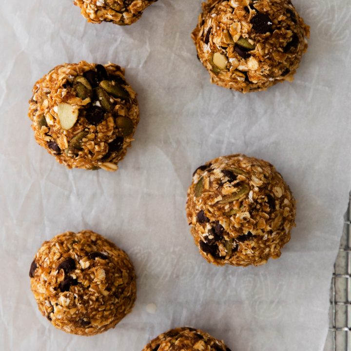 no bake lactation bites with pumpkin on parchment paper