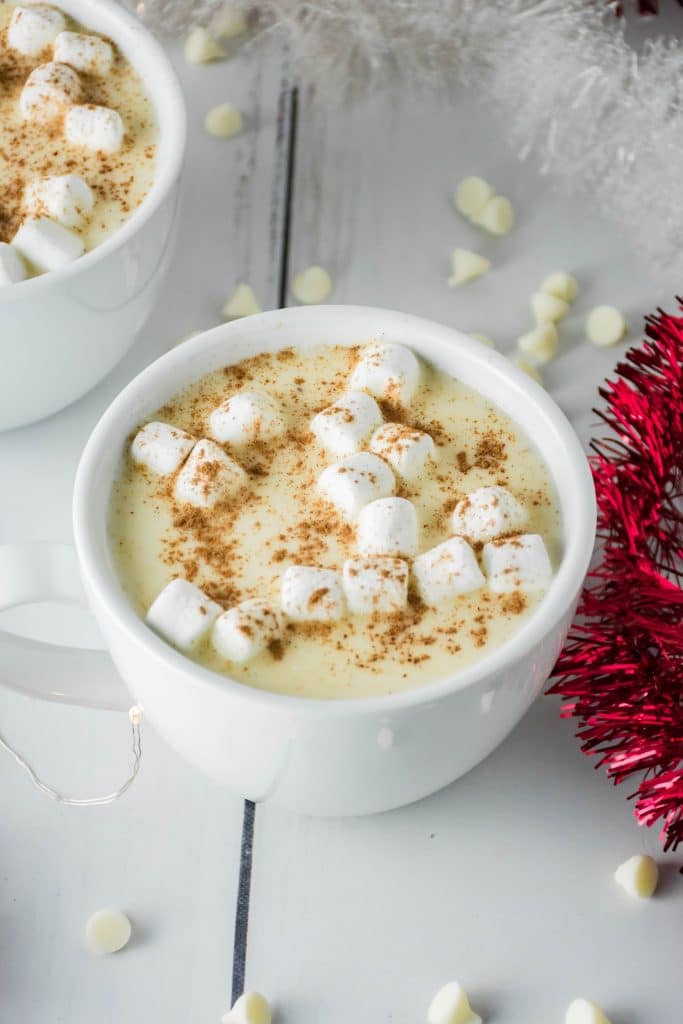 zoomedout shot of the hot chocolate in a white mug