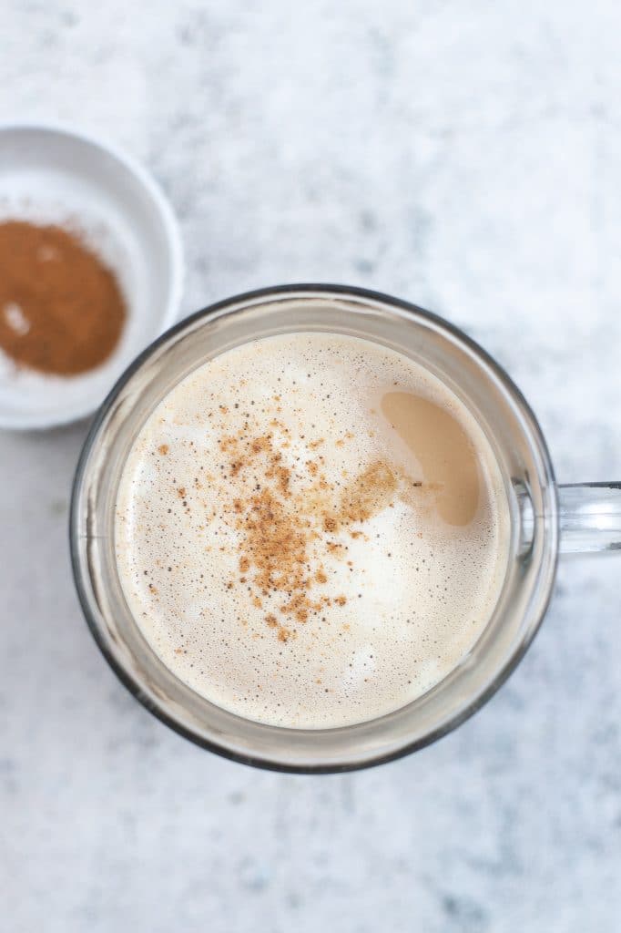 overhead shot of eggnog latte with nutmeg on top