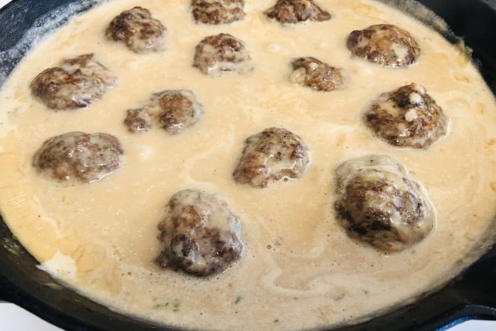 add the meatballs to the sauce