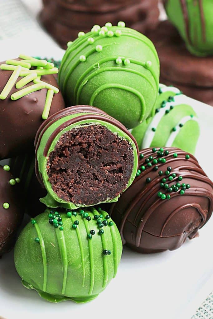 Mint Cookie Truffles on a plate with one open