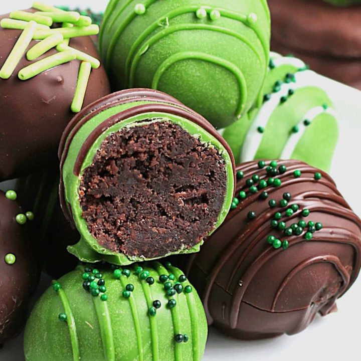 Mint Cookie Truffles on a plate with one open