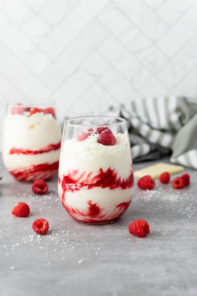 finished white chocolate mousse with raspberries 