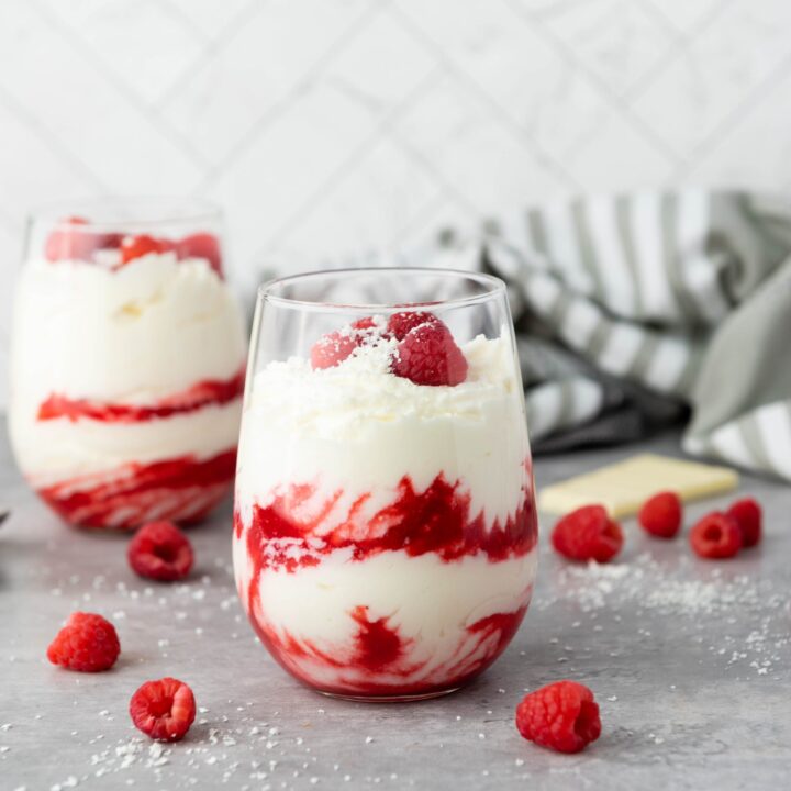 finished white chocolate mousse with raspberries