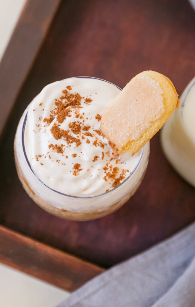 overhead shot of the tiramisu latte with a lady finger