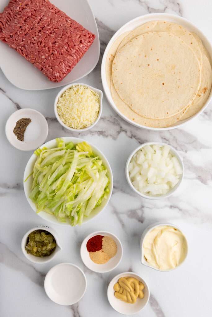 overhead shot of ingredients needed for smash burger tacos 