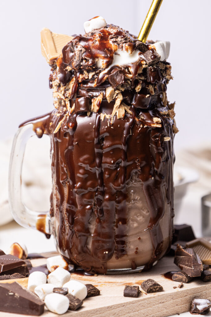 close up of chocolate freakshake on cutting board